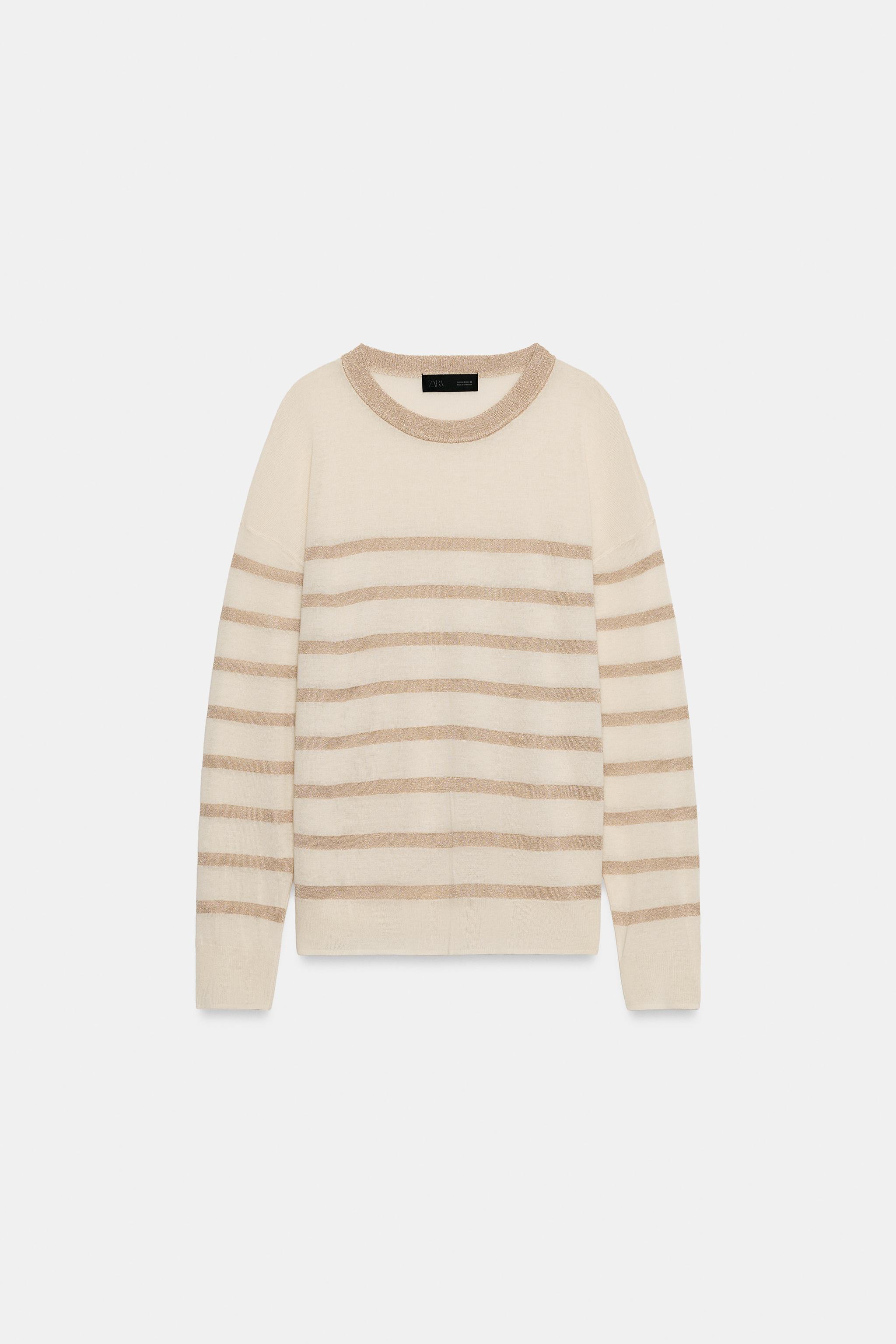 PULL EN MAILLE À RAYURES ET FIL MÉTALLISÉ
